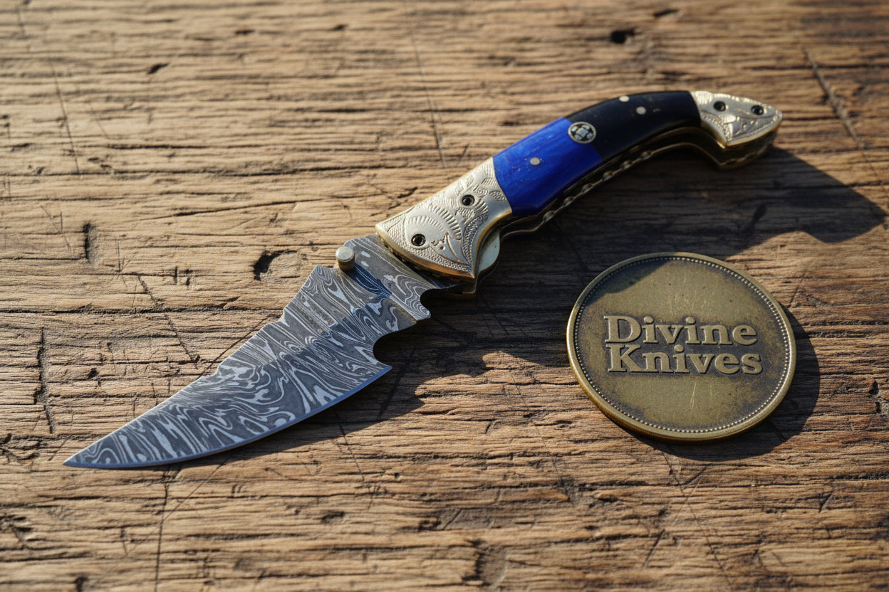 Engraved Blue Damascus Pocket Knife with Scrollwork Bolsters