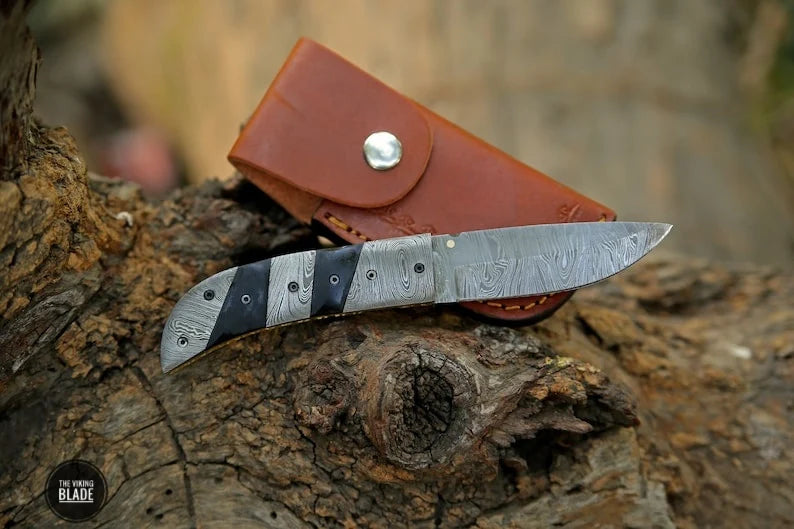 Buffalo Horn Clip Point Folding Knife with Leather Pouch