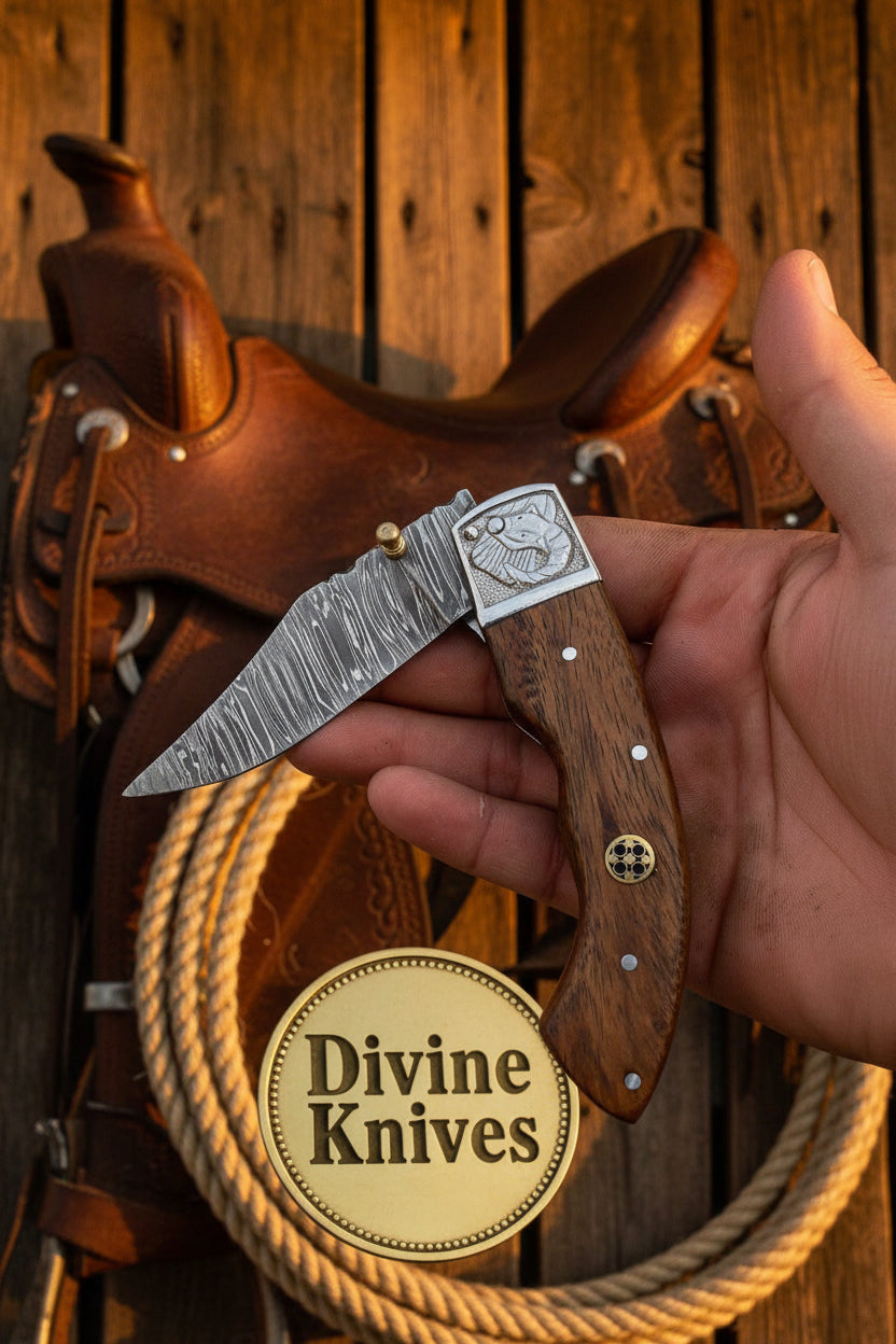Tuskforge Damascus Folder with Engraved Tusk Bolster