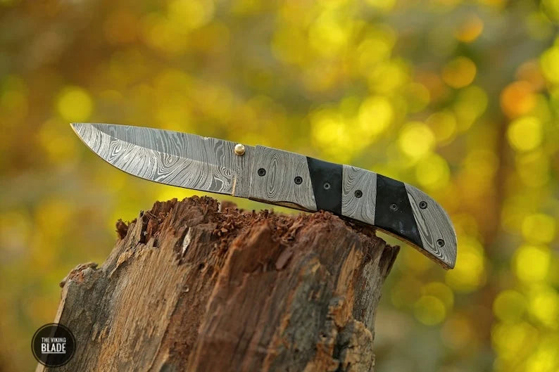 Buffalo Horn Clip Point Folding Knife with Leather Pouch